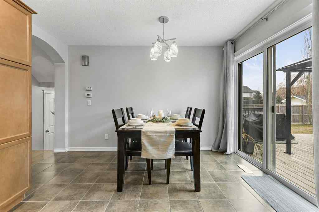MLS® # A2270671 - 25 McKinnon Street NW in NONE Langdon, Residential Open Houses