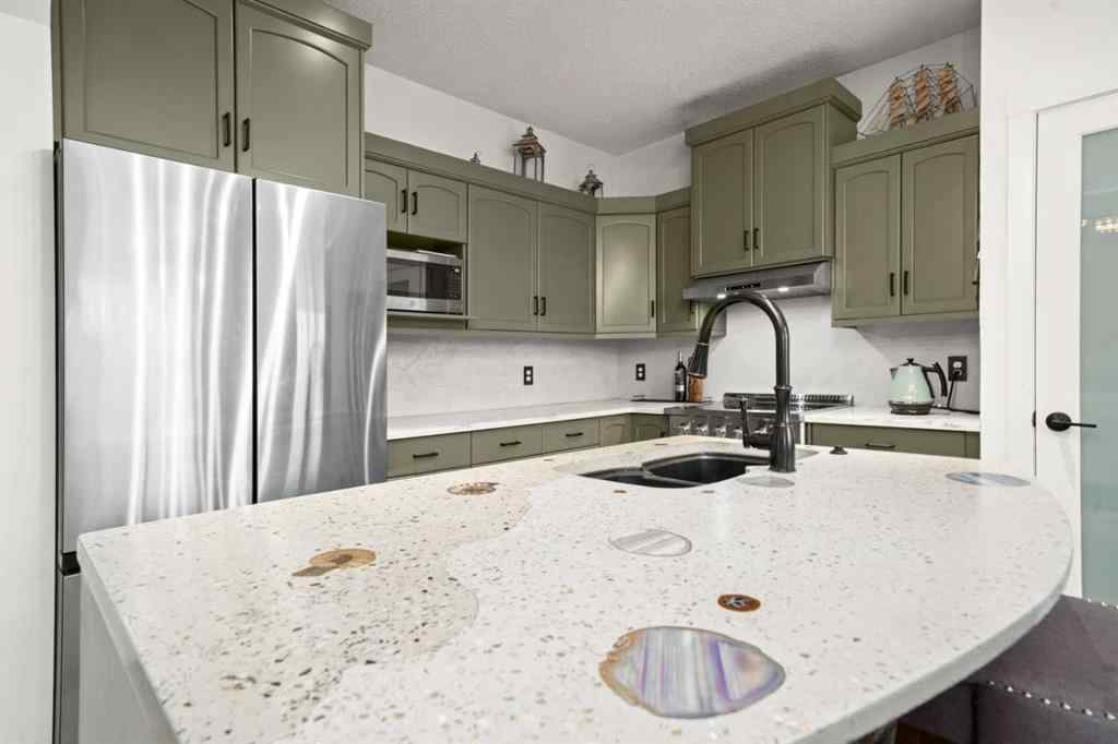 MLS® # A2270676 - 18 Cimarron Grove Bay  in Cimarron Grove Okotoks, Residential Open Houses