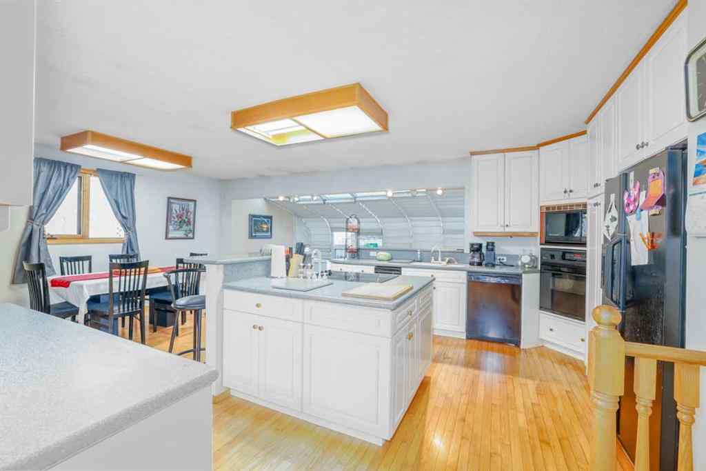 MLS® A2270696 - 312 Queensland Road SE in Queensland Calgary, Residential