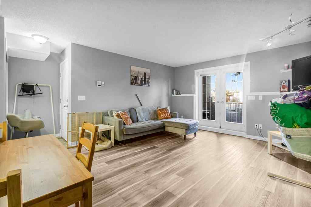 MLS&reg; # A2270701 - Unit #102 139 26 Avenue NW in Tuxedo Park Calgary, Residential Open Houses