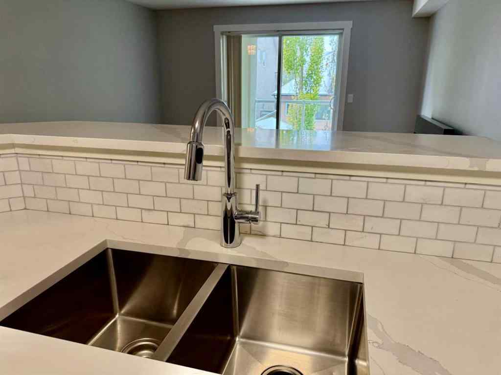 MLS&reg; # A2270708 - Unit #1212 2518 Fish Creek Boulevard SW in Evergreen Calgary, Residential Open Houses