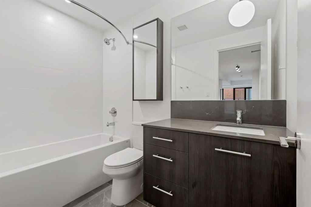 MLS&reg; # A2270740 - Unit #207 730 2 Avenue SW in Eau Claire Calgary, Residential Open Houses