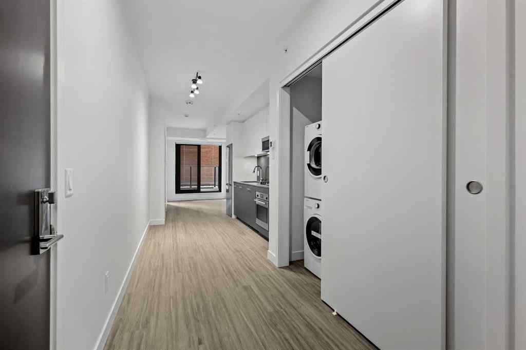 MLS&reg; # A2270740 - Unit #207 730 2 Avenue SW in Eau Claire Calgary, Residential Open Houses