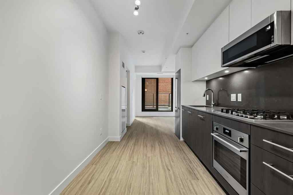 MLS&reg; # A2270740 - Unit #207 730 2 Avenue SW in Eau Claire Calgary, Residential Open Houses