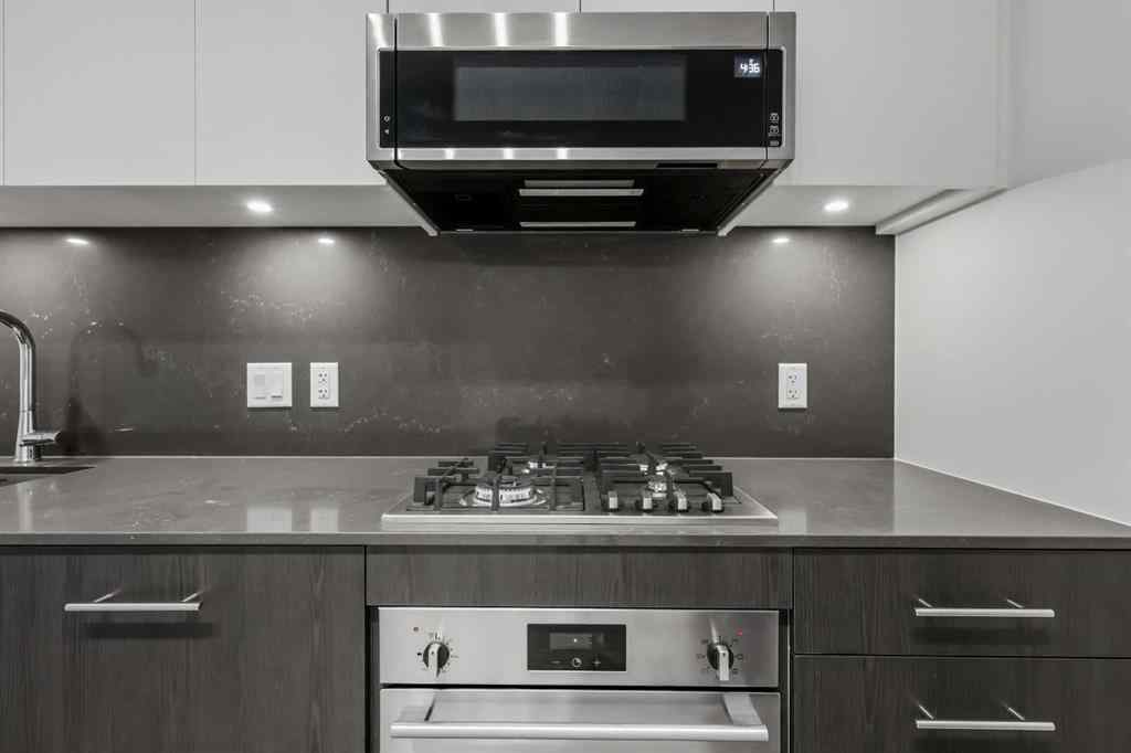 MLS&reg; # A2270740 - Unit #207 730 2 Avenue SW in Eau Claire Calgary, Residential Open Houses