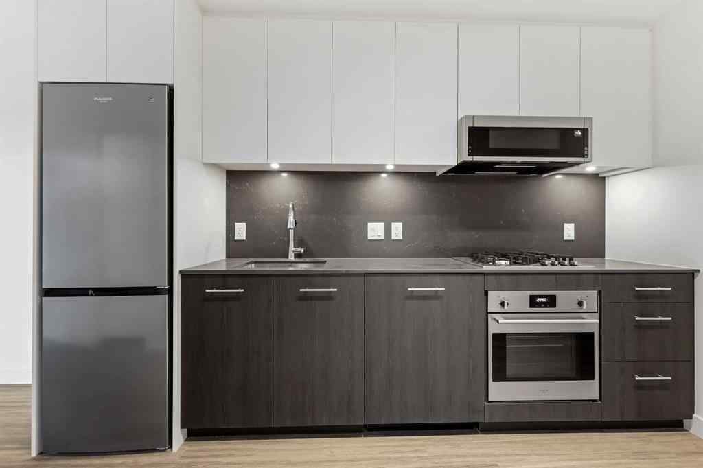 MLS&reg; # A2270740 - Unit #207 730 2 Avenue SW in Eau Claire Calgary, Residential Open Houses