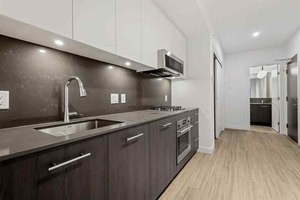 MLS&reg; # A2270740 - Unit #207 730 2 Avenue SW in Eau Claire Calgary, Residential Open Houses