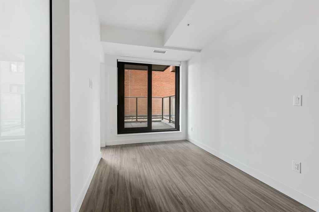 MLS&reg; # A2270740 - Unit #207 730 2 Avenue SW in Eau Claire Calgary, Residential Open Houses