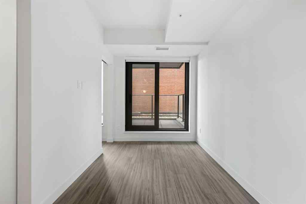 MLS&reg; # A2270740 - Unit #207 730 2 Avenue SW in Eau Claire Calgary, Residential Open Houses