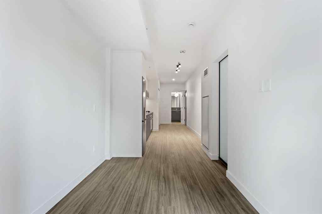 MLS&reg; # A2270740 - Unit #207 730 2 Avenue SW in Eau Claire Calgary, Residential Open Houses