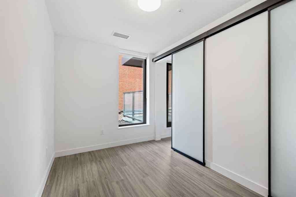 MLS&reg; # A2270740 - Unit #207 730 2 Avenue SW in Eau Claire Calgary, Residential Open Houses