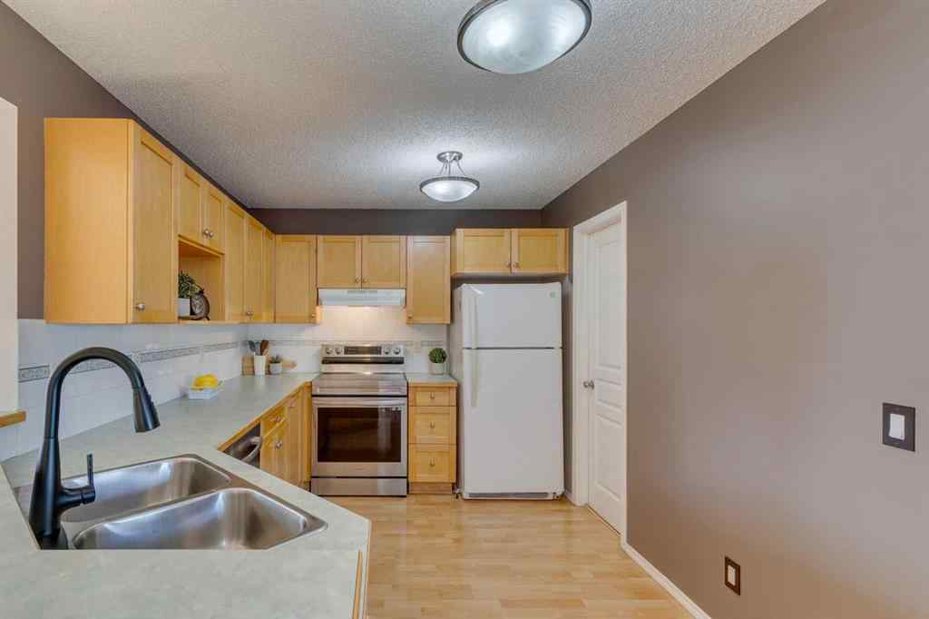 MLS&reg; # A2270764 - 228 Luxstone Place SW in Luxstone Airdrie, Residential Open Houses