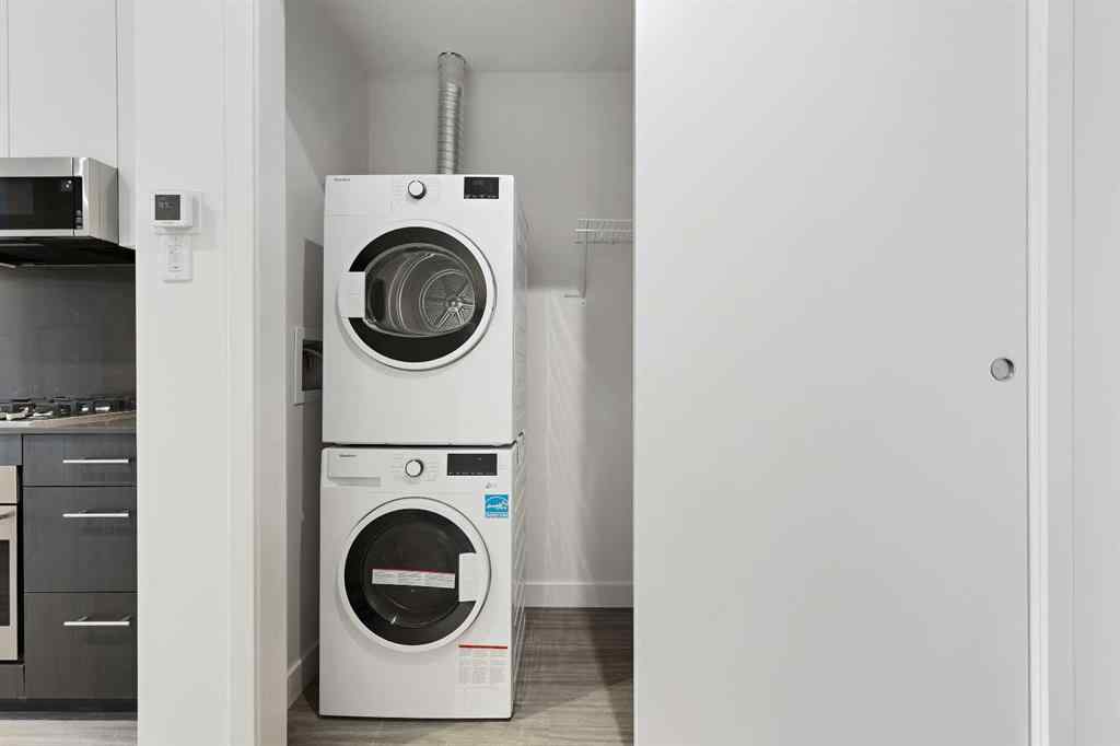 MLS&reg; # A2270768 - Unit #1103 730 2 Avenue SW in Eau Claire Calgary, Residential Open Houses