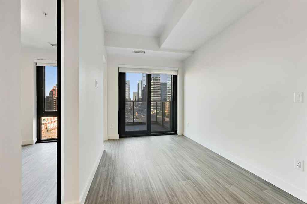 MLS&reg; # A2270768 - Unit #1103 730 2 Avenue SW in Eau Claire Calgary, Residential Open Houses