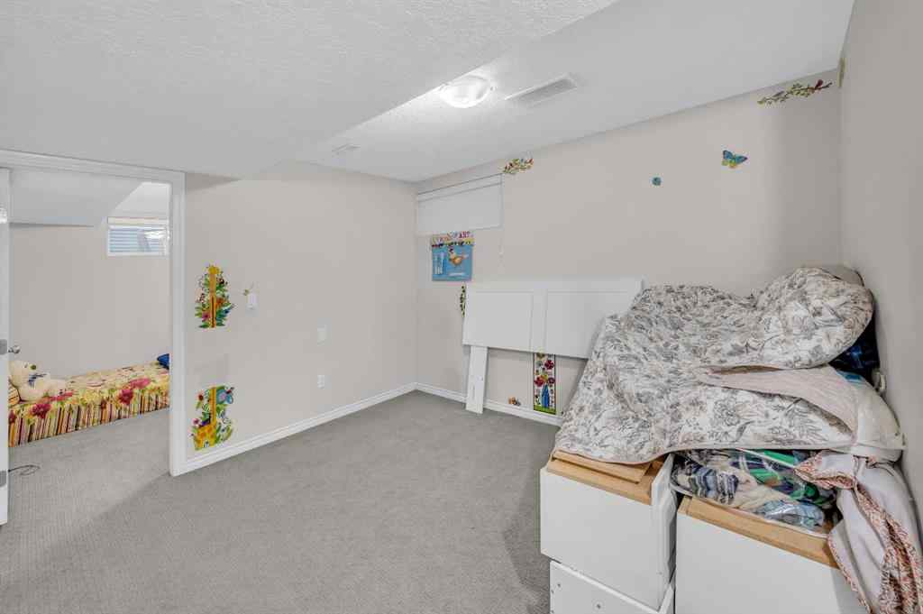 MLS® A2270779 - 144 Saddlecrest Place NE in Saddle Ridge Calgary, Residential