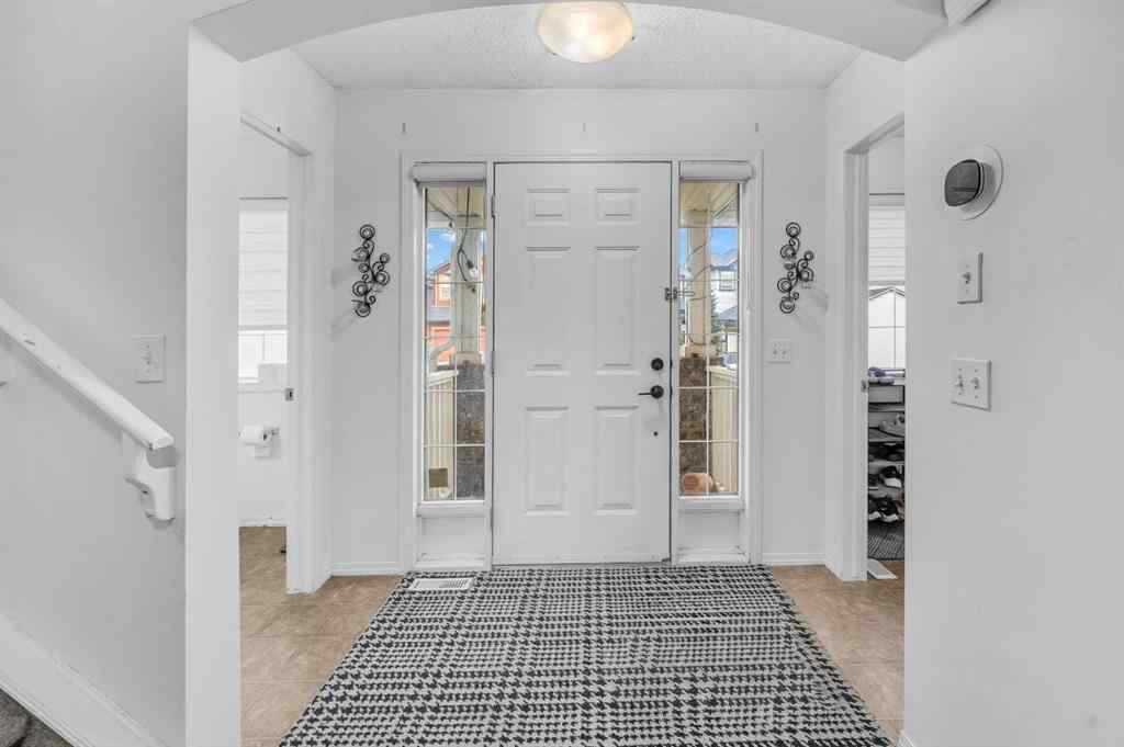 MLS® A2270779 - 144 Saddlecrest Place NE in Saddle Ridge Calgary, Residential