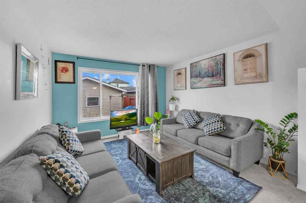 MLS® A2270779 - 144 Saddlecrest Place NE in Saddle Ridge Calgary, Residential