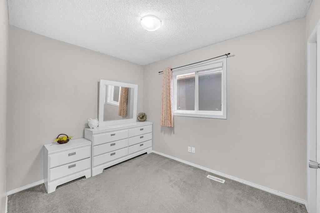 MLS® A2270779 - 144 Saddlecrest Place NE in Saddle Ridge Calgary, Residential