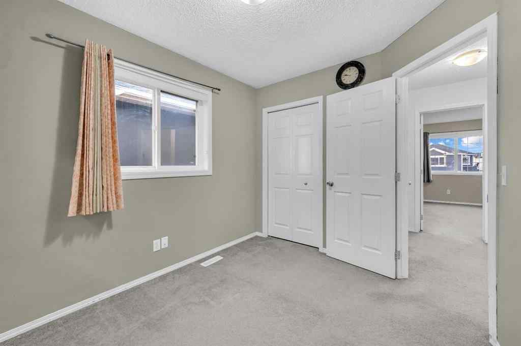 MLS® A2270779 - 144 Saddlecrest Place NE in Saddle Ridge Calgary, Residential