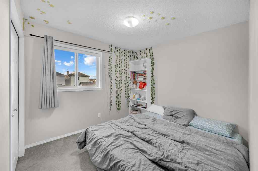 MLS® A2270779 - 144 Saddlecrest Place NE in Saddle Ridge Calgary, Residential