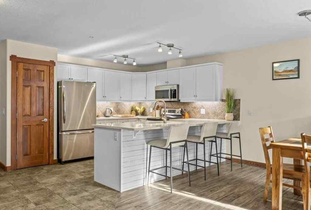 MLS&reg; # A2270792 - Unit #319 170 Crossbow Place   in Three Sisters Canmore, Residential Open Houses