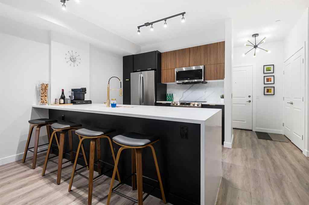 MLS&reg; # A2270817 - Unit #110 910 18 Avenue SW in Lower Mount Royal Calgary, Residential Open Houses