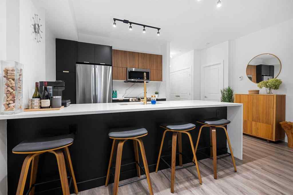 MLS&reg; # A2270817 - Unit #110 910 18 Avenue SW in Lower Mount Royal Calgary, Residential Open Houses