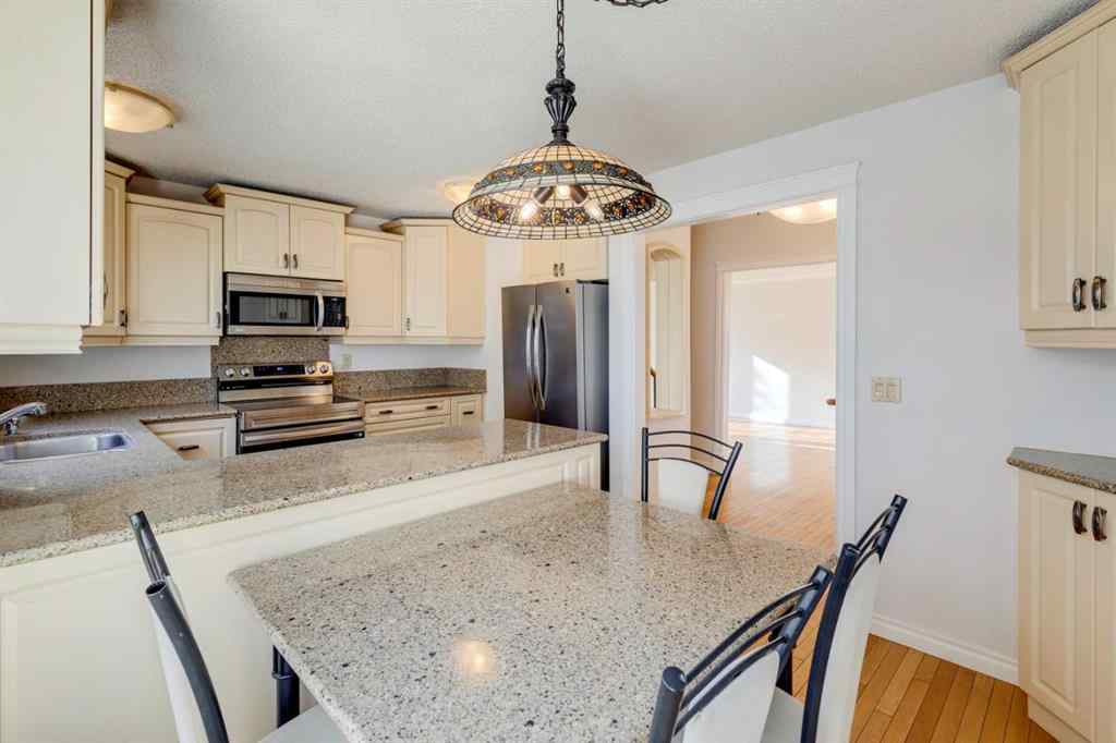 MLS® # A2270924 - 203 Edgeland Road NW in Edgemont Calgary, Residential Open Houses