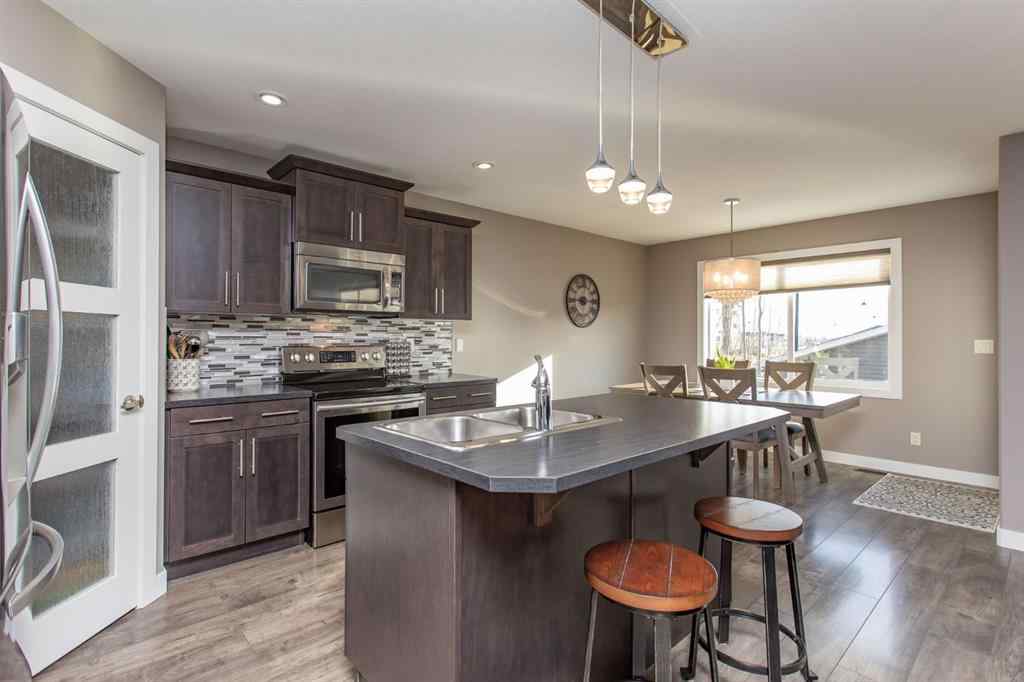 MLS&reg; # A2270926 - 371 Lancaster Drive  in Lancaster Meadows Red Deer, Residential Open Houses