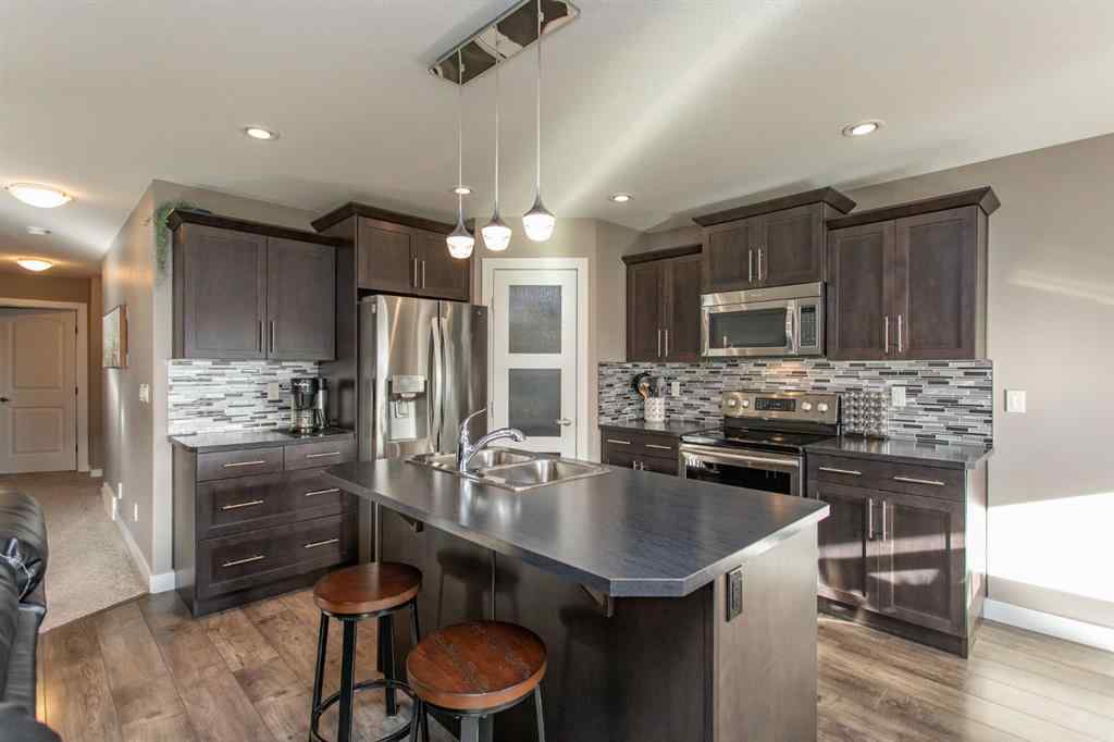 MLS&reg; # A2270926 - 371 Lancaster Drive  in Lancaster Meadows Red Deer, Residential Open Houses