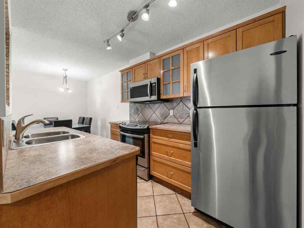 MLS&reg; # A2270939 - Unit #407 617 56 Avenue SW in Windsor Park Calgary, Residential Open Houses