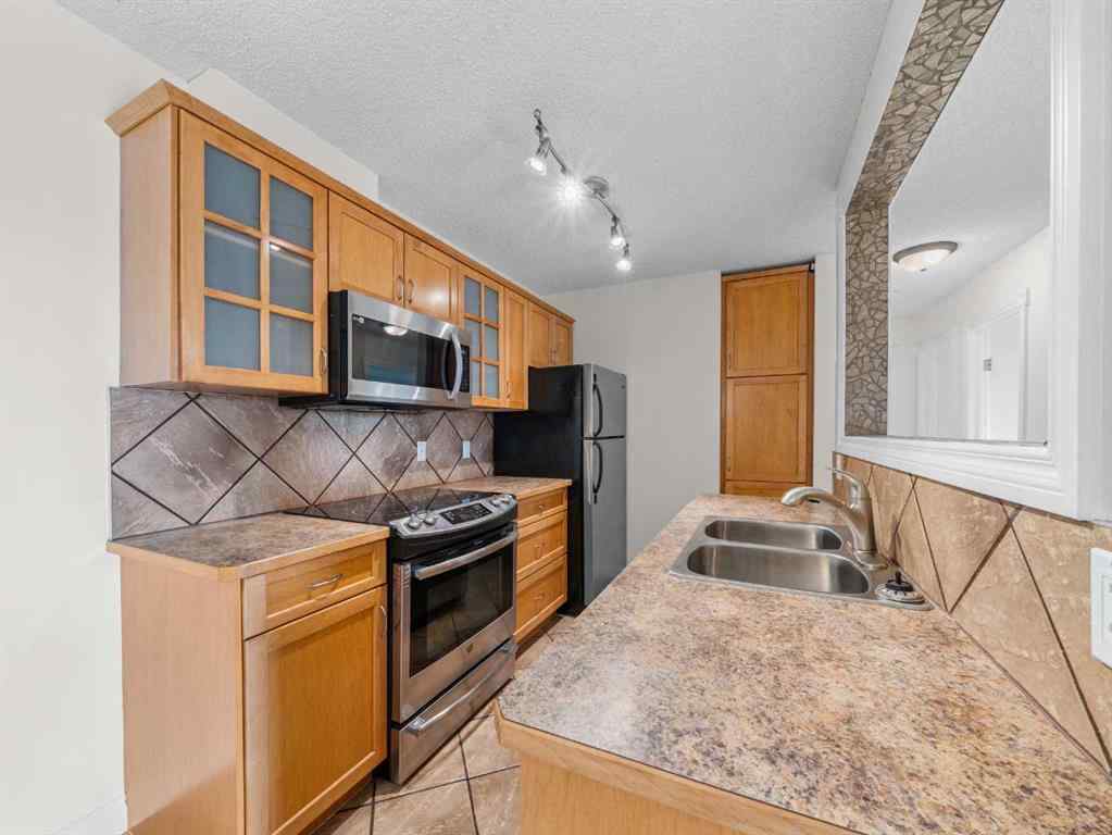 MLS&reg; # A2270939 - Unit #407 617 56 Avenue SW in Windsor Park Calgary, Residential Open Houses