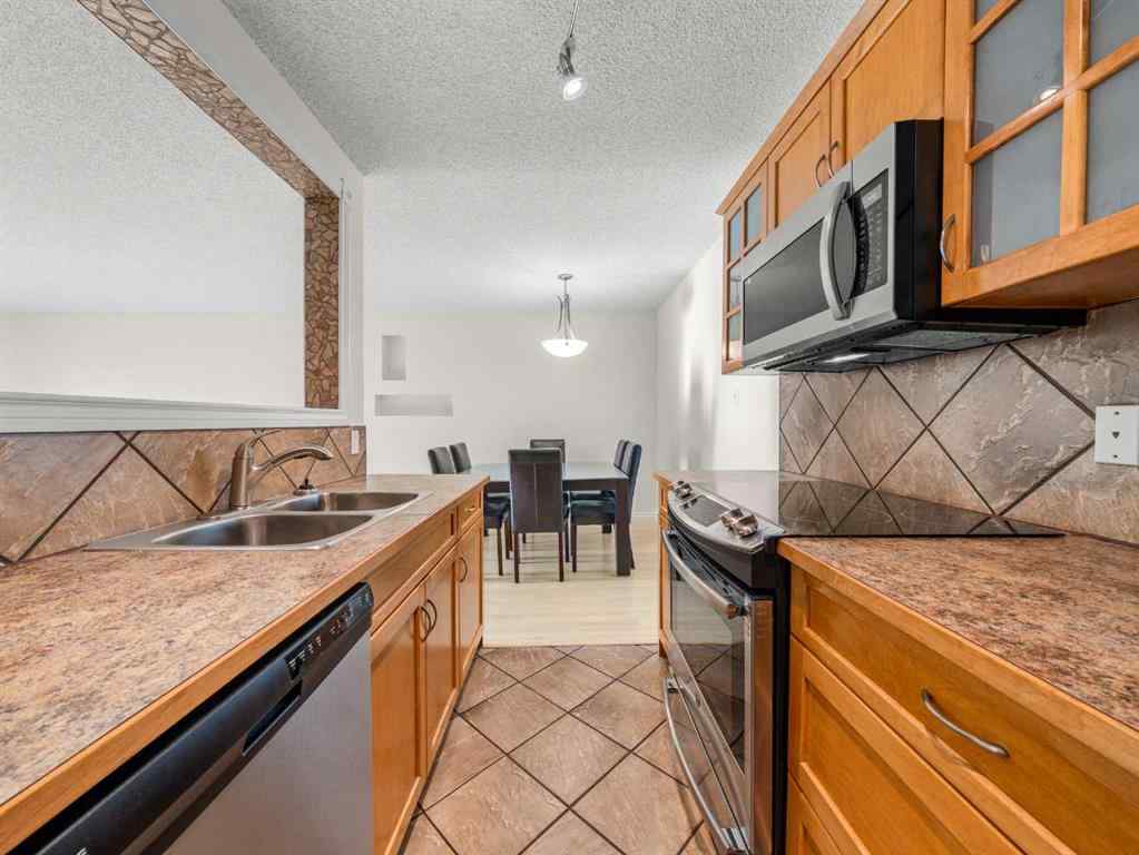 MLS&reg; # A2270939 - Unit #407 617 56 Avenue SW in Windsor Park Calgary, Residential Open Houses