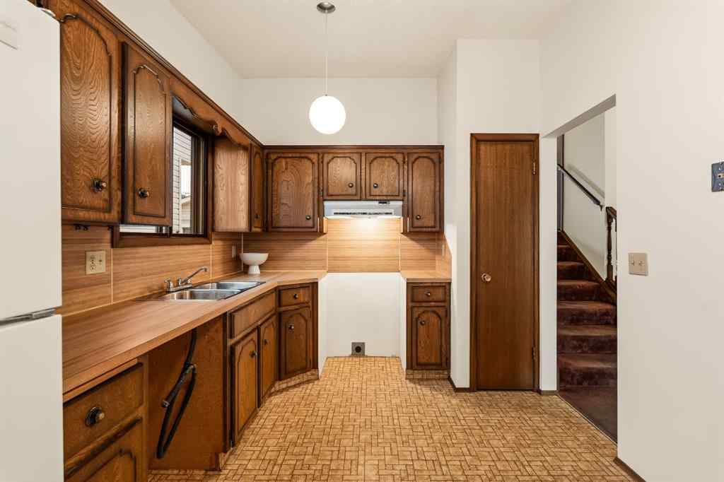 MLS® A2270961 - 44 Macewan Glen Way NW in MacEwan Glen Calgary, Residential