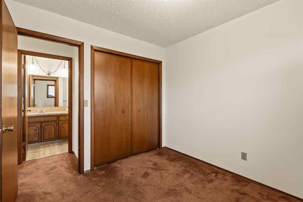 MLS® A2270961 - 44 Macewan Glen Way NW in MacEwan Glen Calgary, Residential