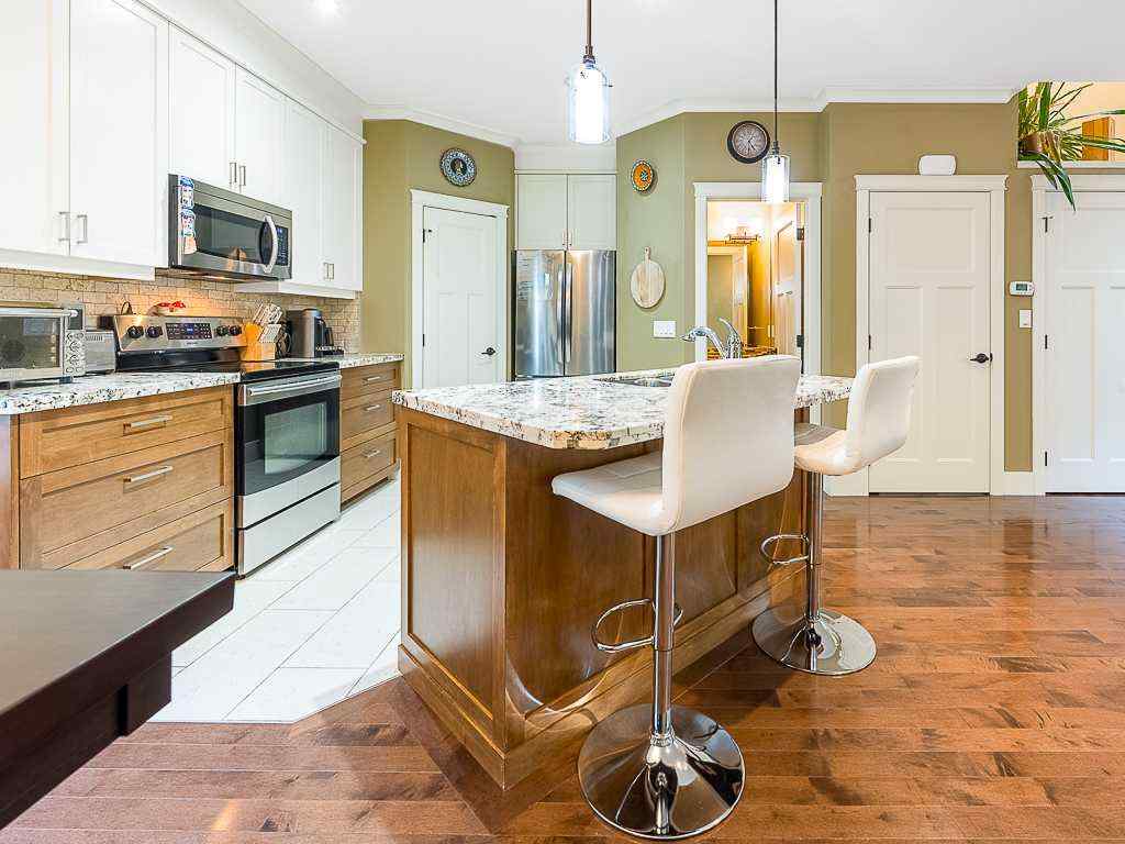 MLS® # A2270967 - Unit #2 126 27 Avenue NW in Tuxedo Park Calgary, Residential Open Houses