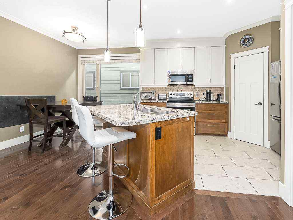 MLS® # A2270967 - Unit #2 126 27 Avenue NW in Tuxedo Park Calgary, Residential Open Houses