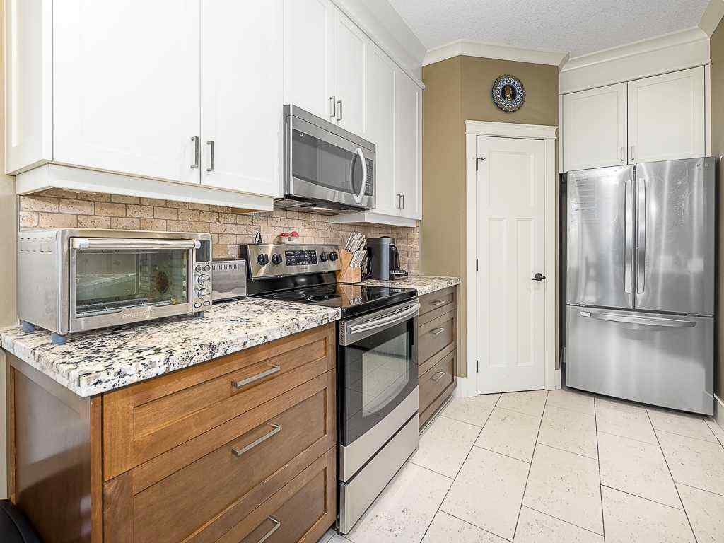 MLS® # A2270967 - Unit #2 126 27 Avenue NW in Tuxedo Park Calgary, Residential Open Houses