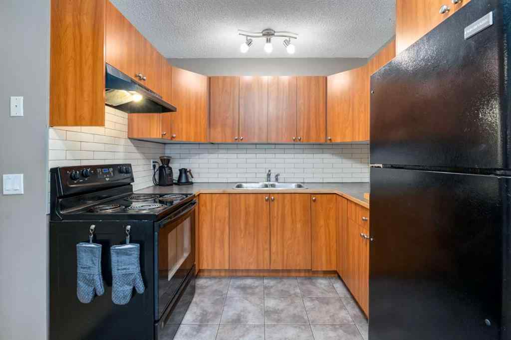 MLS&reg; # A2270977 - Unit #D 4528 73 Street NW in Bowness Calgary, Residential Open Houses