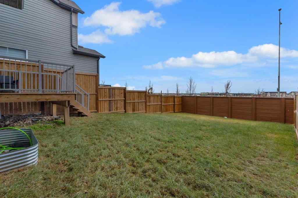 MLS&reg; # A2270980 - 704 Creekstone Circle SW in Pine Creek Calgary, Residential Open Houses