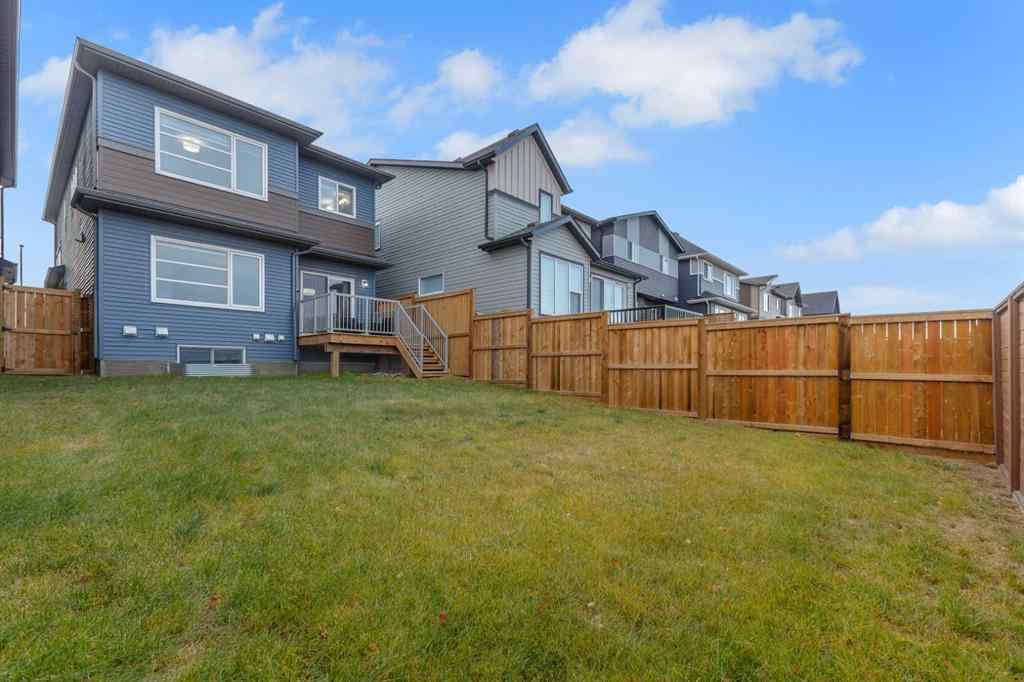 MLS&reg; # A2270980 - 704 Creekstone Circle SW in Pine Creek Calgary, Residential Open Houses