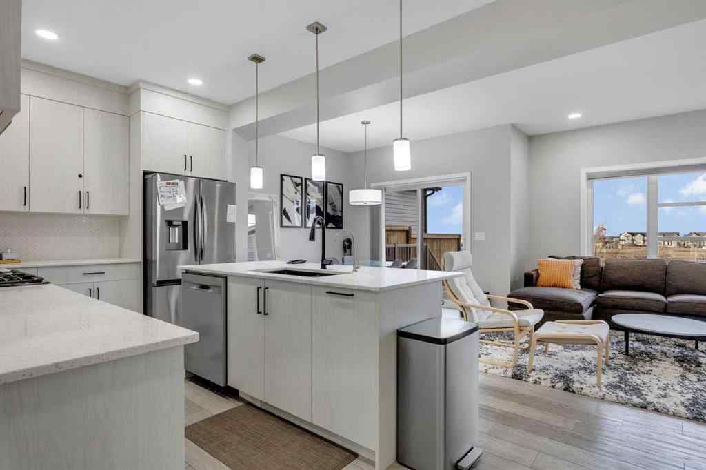 MLS&reg; # A2270980 - 704 Creekstone Circle SW in Pine Creek Calgary, Residential Open Houses