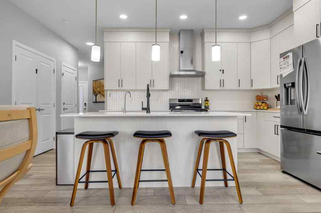 MLS&reg; # A2270980 - 704 Creekstone Circle SW in Pine Creek Calgary, Residential Open Houses