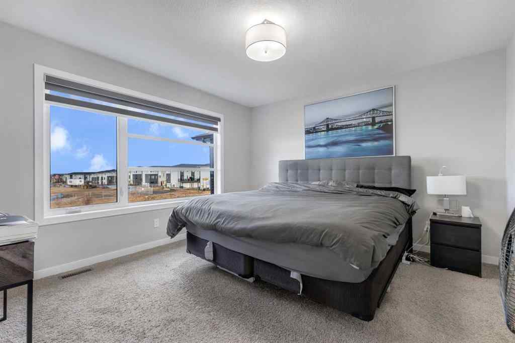 MLS&reg; # A2270980 - 704 Creekstone Circle SW in Pine Creek Calgary, Residential Open Houses