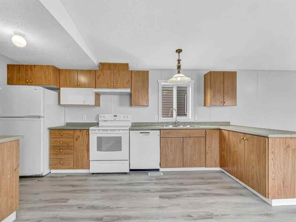 MLS&reg; # A2270983 - 57 Maple Drive W in Sunnylea Brooks, Mobile Open Houses