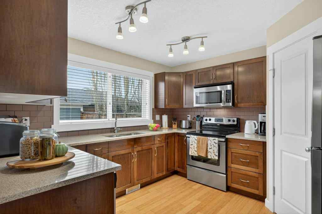 MLS&reg; # A2270985 - 18 West Coach Road SW in West Springs Calgary, Residential Open Houses
