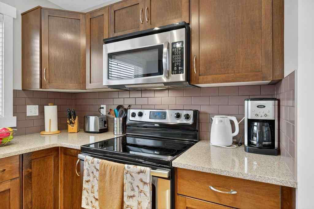 MLS&reg; # A2270985 - 18 West Coach Road SW in West Springs Calgary, Residential Open Houses