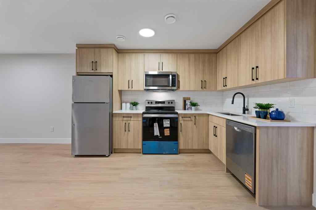 MLS&reg; # A2271003 - 7931 47 Avenue NW in Bowness Calgary, Residential Open Houses