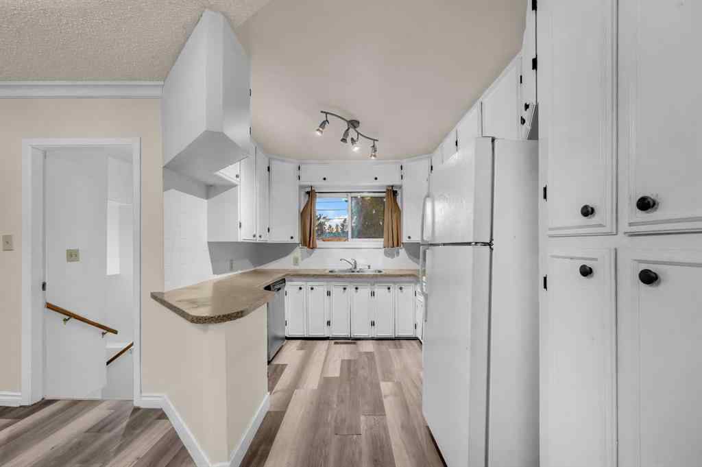 MLS&reg; # A2271011 - 1527 52 Street SE in Forest Lawn Calgary, Residential Open Houses