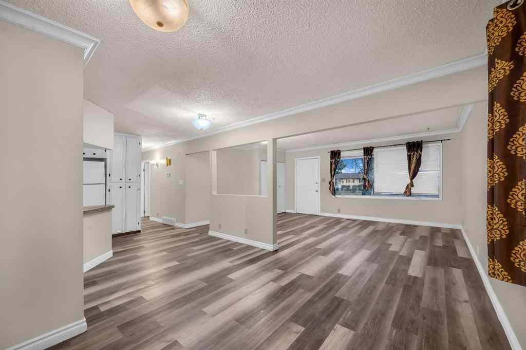 MLS&reg; # A2271011 - 1527 52 Street SE in Forest Lawn Calgary, Residential Open Houses